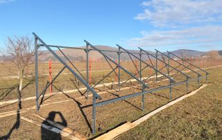 structura-suport-metalica-panouri-fotovoltaice-la-sol-42 structura metalica la sol pentru parc fotovoltaic pe piloni vibropresati in sol